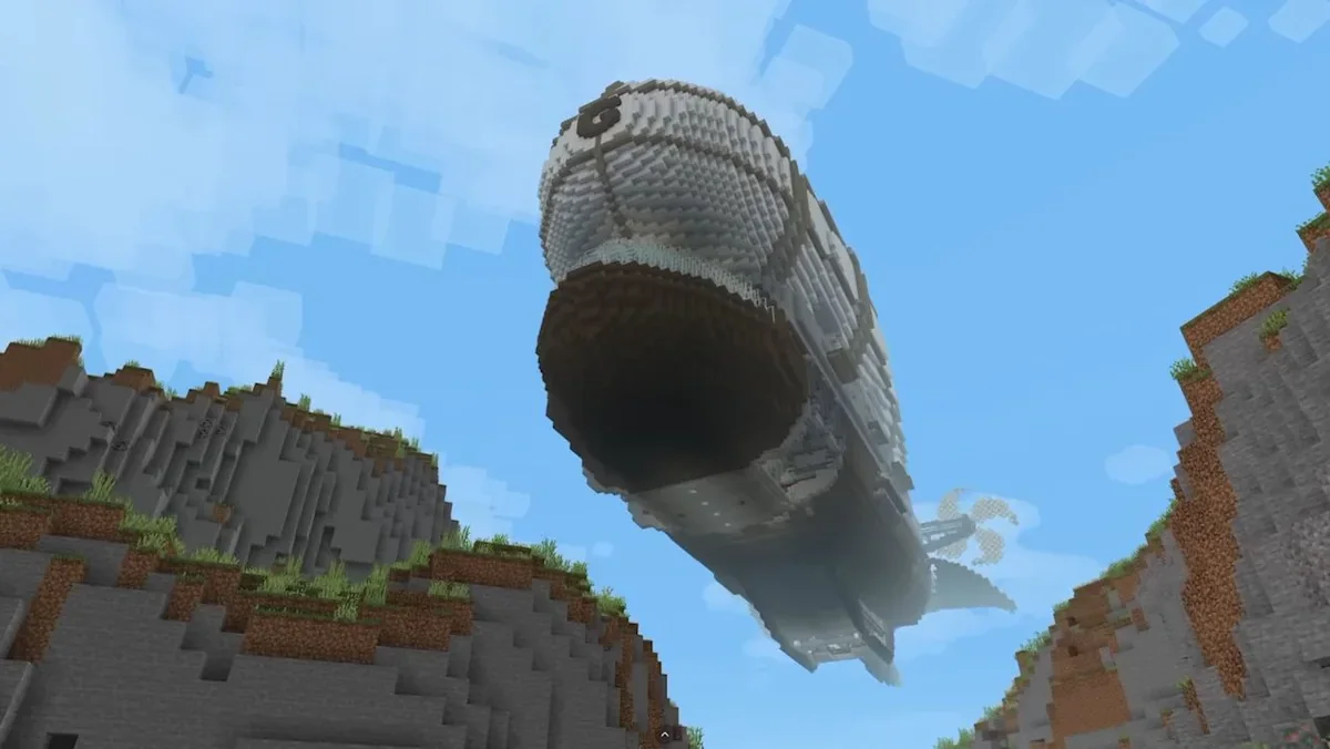 A giant airship appearing between two mountains